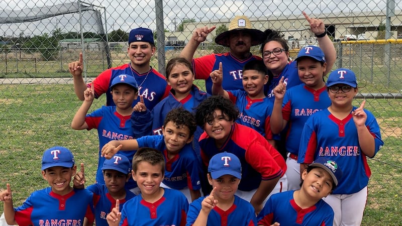 Jesus Martinez, the little league coach for the farm division team Texas Rangers, led his team...