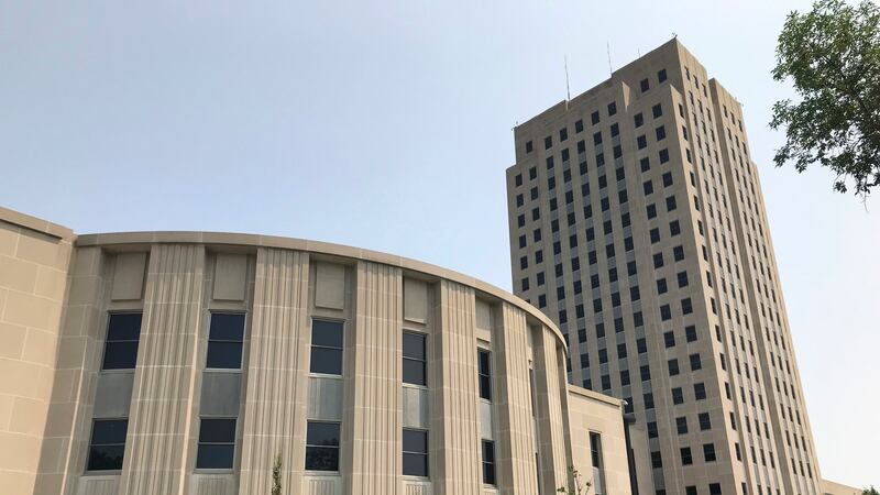 FILE - The North Dakota House chamber and Capitol tower stand in Bismarck, N.D., on Wednesday,...