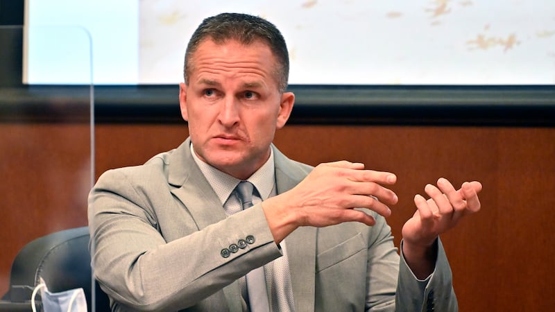FILE - Former Louisville police Officer Brett Hankison talks about seeing a subject in a...