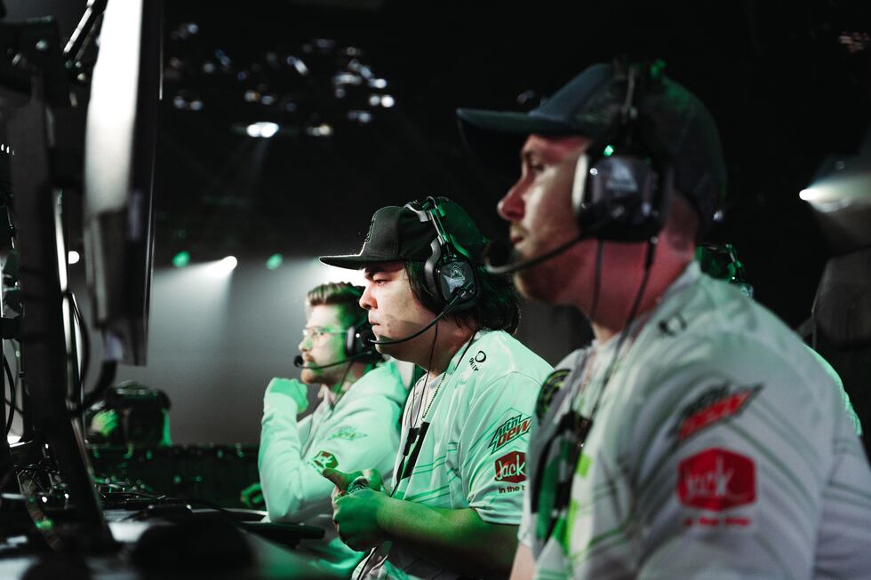 From left, Lucid, FormaL, and Trippy of OpTic Gaming prepare for a match on the main stage of...