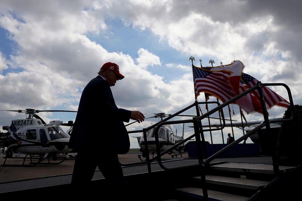 Republican presidential candidate and former President Donald Trump walks on stage as he...