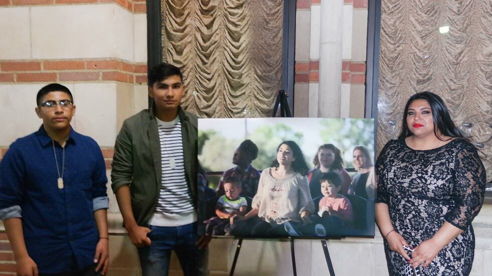 Lupita Garza, her sons, and a photo of the actors portraying them. (Source: Lupita Garza)