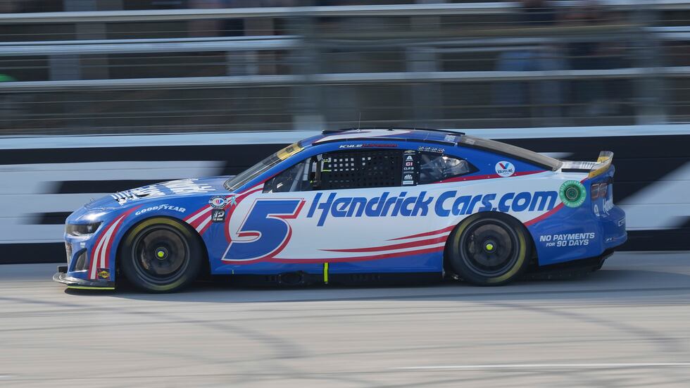 Kyle Larson (5) races in the NASCAR Cup Series auto race at Texas Motor Speedway in Fort...